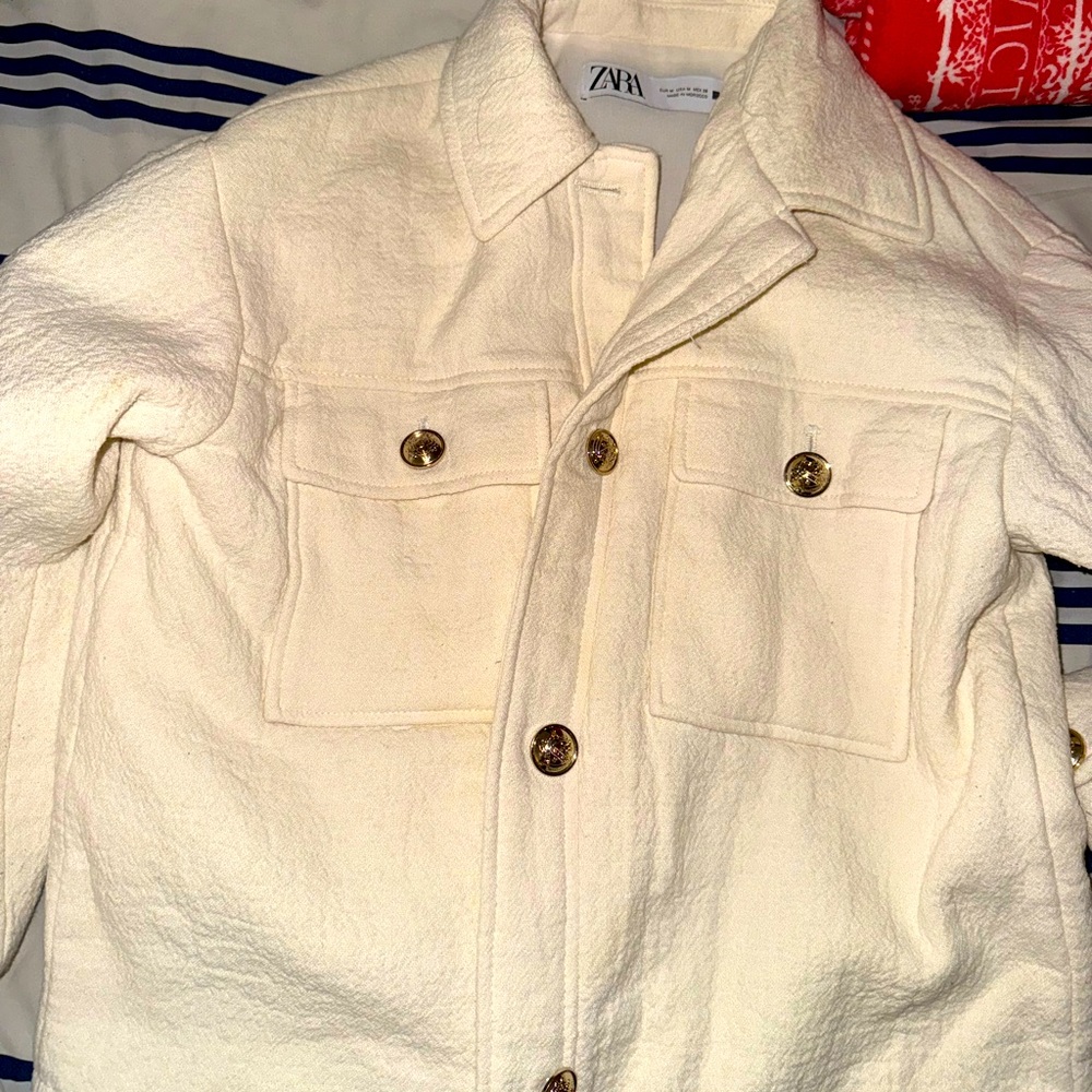 Cream light puffer jacket with gold buttons